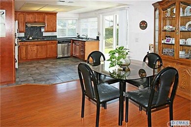 Large Dining Room Open to Remodeled Kitchen