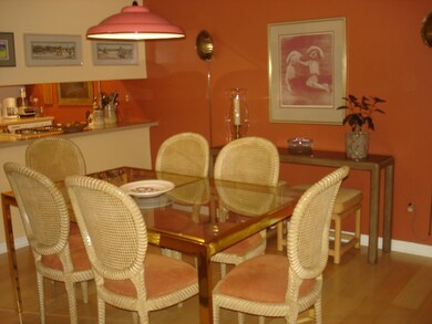 Dining area overlooking kitchen area