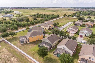 406 Cadiz Loop, Davenport, FL 33837 - photo 4