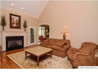 The main family room has hardwood flooring, gas lo