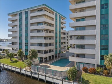 View of property with a water view