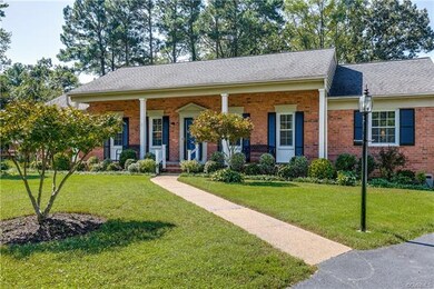Sidewalk leads to covered front porch