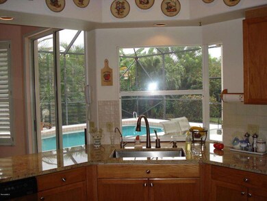 Kitchen sink overlooks the pool area