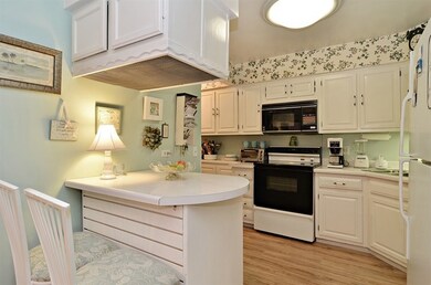 Open Kitchen with breakfast bar. Washer and Dryer