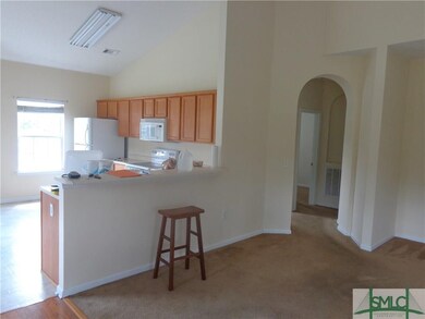 Kitchen/Breakfast Bar and Living Room