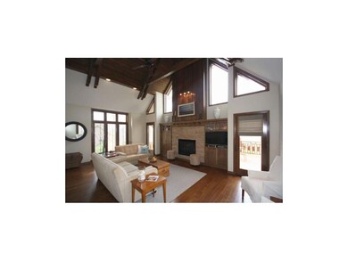 Gorgeous wood beamed, 20' ceilings!  Custom stone 