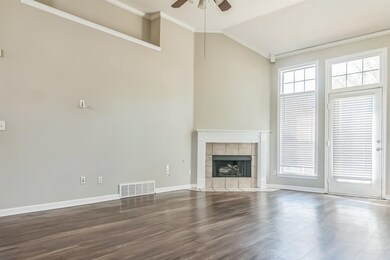 Unfurnished living room featuring ornamental moldi