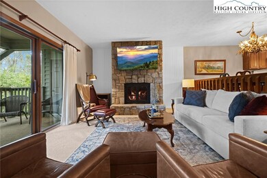 Living room with sliders to the private deck