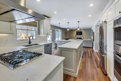 This kitchen is open to the family room and dining