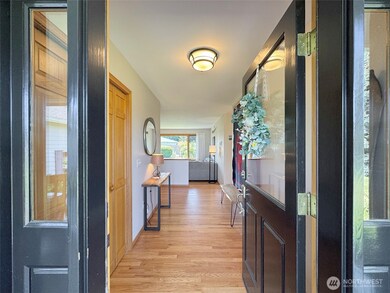 Inviting Entry with Gorgeous Wood Floors