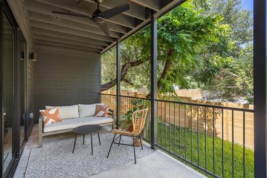 Balcony with outdoor lounge area and ceiling fan