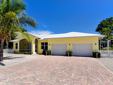 Two Car Garage with Paver Driveway