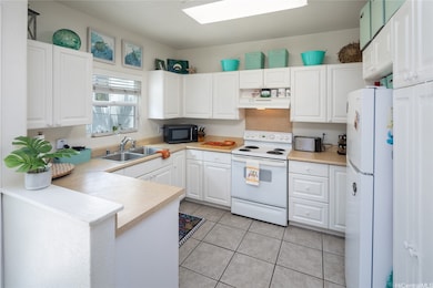 Roomy kitchen with generous countertop space and a