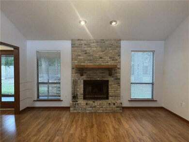 Fireplace Living Room Looks out to Backyard
