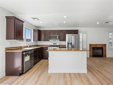 Kitchen featuring appliances with stainless steel