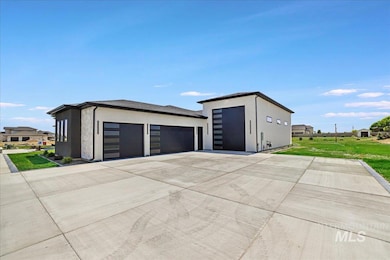 Garage with concrete driveway