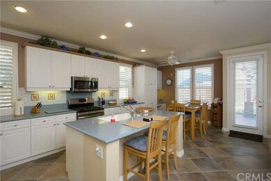 Across kitchen island toward back yard.
