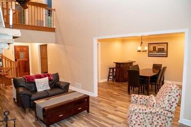 Living room featuring light hardwood / wood-style 