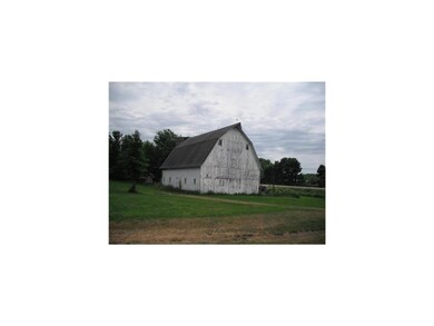 Front Exterior. Barn & outbuildings on the propert