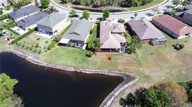 AERIAL VIEW OF POND, YARD AND HOUSE