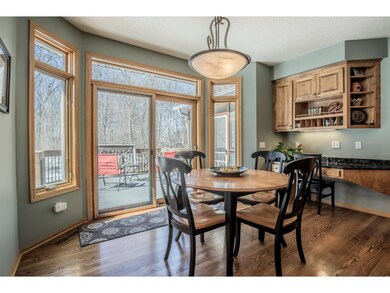 Window wrapped dinette with easy deck access offer
