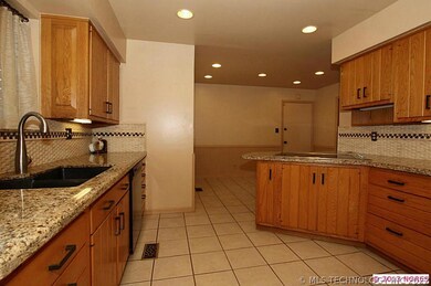 The kitchen cabinets feature: a built-in spice rac