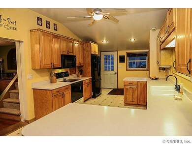 Kitchen Tons of cupboard space and a breakfast bar