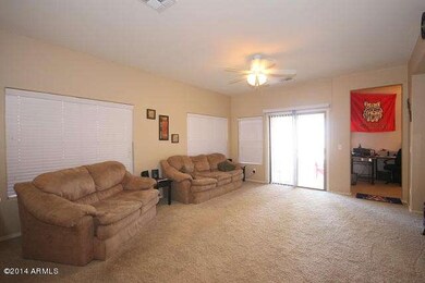 Living room with doors to backyard