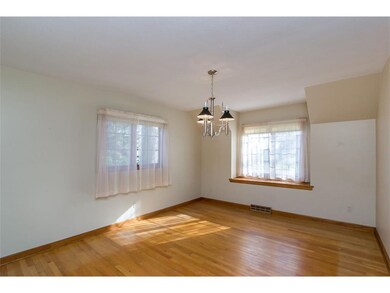 Dining room with hardwood floors.