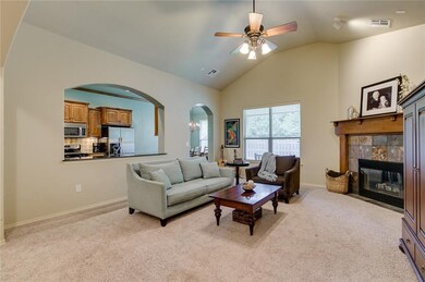 The kitchen is separate from the living room, but 