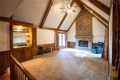 Stunning Brick Fireplace - Floor to Ceiling Windows