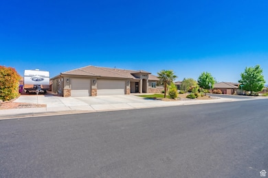 Ranch-style home featuring a tile roof, stone siding, concrete driveway, a garage, and stucco siding