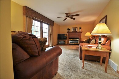 The wood-burning fireplace and natural light light
