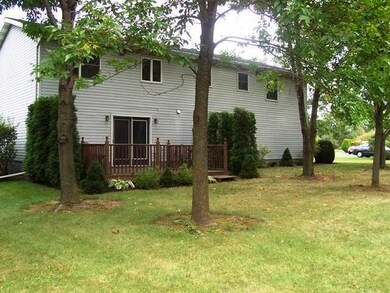 Exterior Front. Back view of home, yard, and lands
