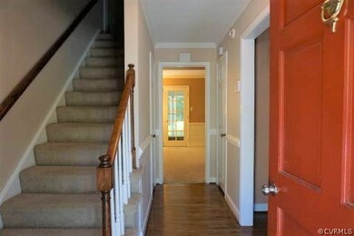 Greet friends & family in this lovely foyer.
