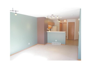Living Room. OPEN FLOOR PLAN. UPGRADED LIGHTING.