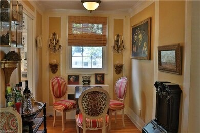 The dining room is the perfect nook between the kitchen and living room. Large enough for a table and chairs, or use an extension of the kitchen, or a small office space.