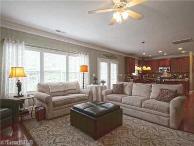 Den/Family/Great Room. As the kitchen is open to the breakfast room and den, this area will become the hub of your new home.  Access the covered deck from French doors in the breakfast area.