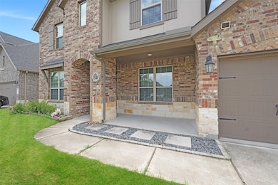 Front Elevation showing Covered Patio.