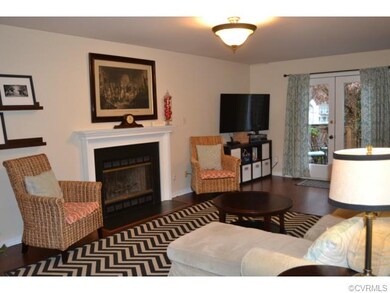 Family Room has French doors to the deck & wood bu