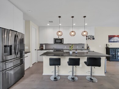 Kitchen featuring 7-Stage Reverse Osmosis System, stainless steel appliances including smart refrigerator