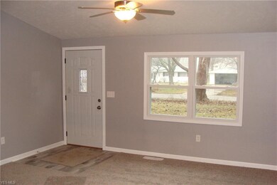 Livingroom with new windows, lighting and flooring