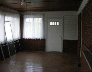 Sunroom. Was used for storage the Sunroom adds liv