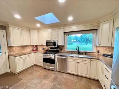 Updated eat-in kitchen with Amish made cabinets