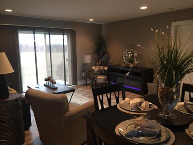 3951 Quincy Meadows Ct unit 33, Holland, MI 49424 - photo 3