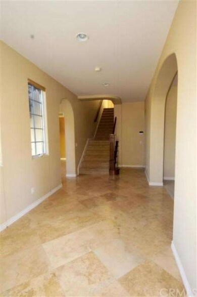 another view of the foyer with stairway