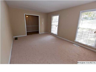 Living Room with new painbt and new carpet through