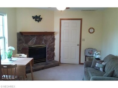 The family room is cozy and boasts a gas fireplace