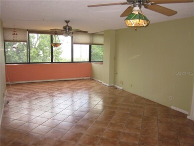 SPACIOUS TILED LIVING ROOM (WITH ENCLOSED PORCH)