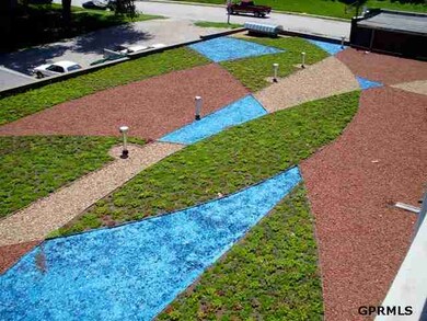 The green roof is not only a work of art, but it cools the air above it, and insulates the heated parking garage below it.  There are no a/c units on the green roof keeping it beautiful and quiet.